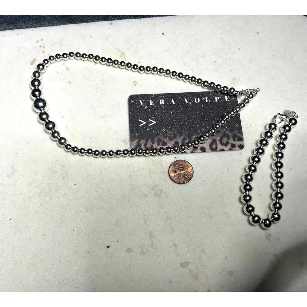^ Beaded Necklace and Bracelet Set